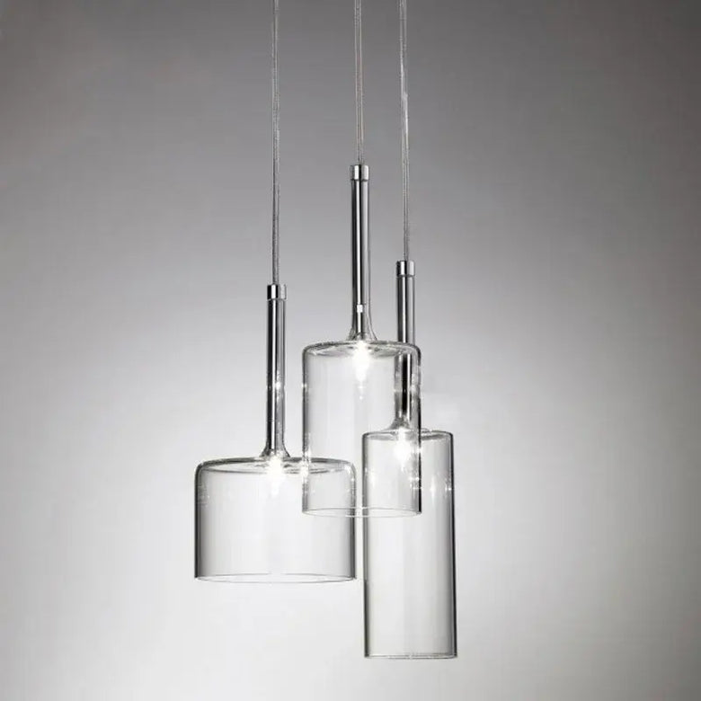 Neo Transparent Scandinavian Light Fixture featuring three transparent glass lampshades with sleek metal accents.