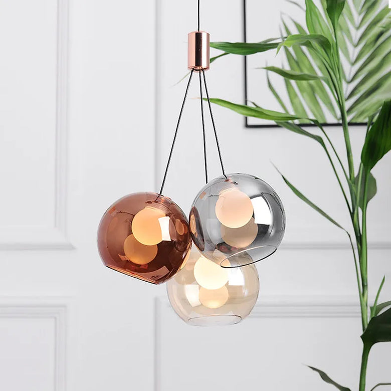 Triple Glass Globe Pendant Light with Rose Gold Accents