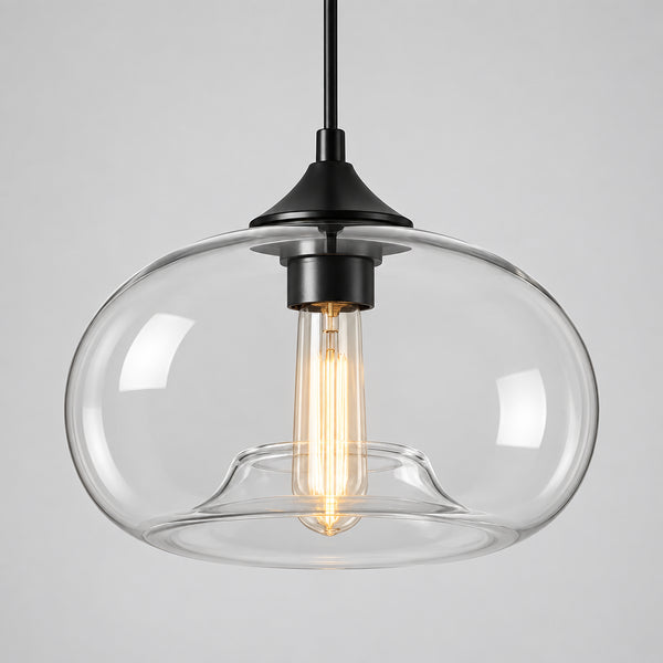 Nordic minimalist glass dome pendant light with a black cable and ceiling plate on a neutral wall