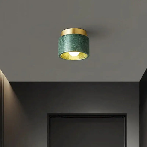 Italian Marble Downlight in Green or White Marble illuminating a modern ceiling in a stylish interior.
