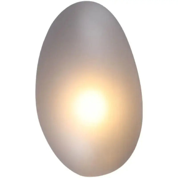 Elegant Frosted Glass Pebble Wall Lamp - Minimalist Nordic Style illuminating softly in a modern setting.