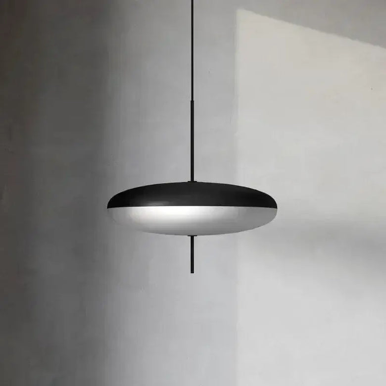 Nordic LED Pebble Pendant Light – Minimalist Ceiling Lamp hanging in a modern interior with soft diffused lighting.