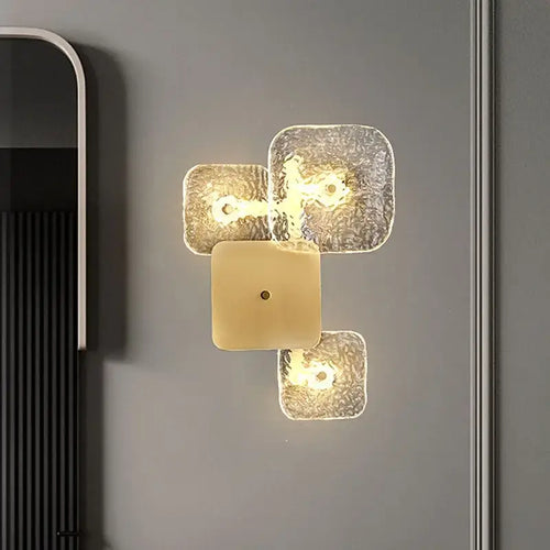 Astonishing Vintage Textured Glass and Brass Wall Lights illuminating a modern space.