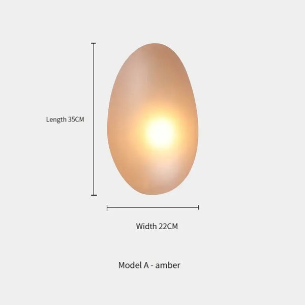 Elegant Frosted Glass Pebble Wall Lamp - Minimalist Nordic Style with amber glow dimensions 35CM x 22CM.