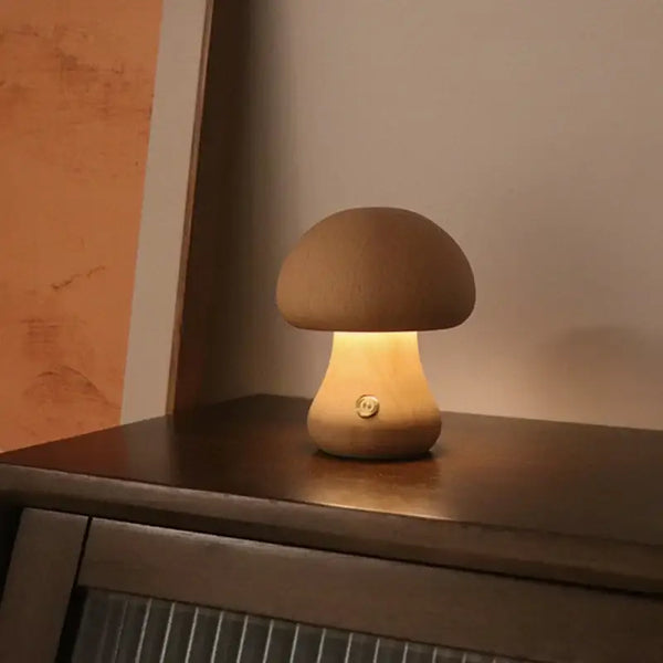 Portable Dimmable 60s Italy Designer Mushroom Table Lamp on a wooden surface, glowing softly.