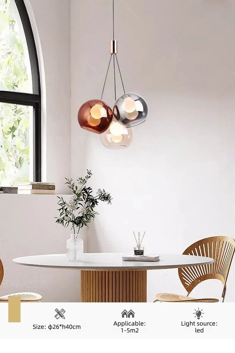 Triple Glass Globe Pendant Light with Rose Gold Accents