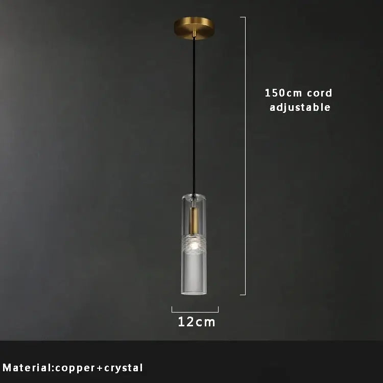 Hero Pendant light with clear glass shade and adjustable cord on a dark background