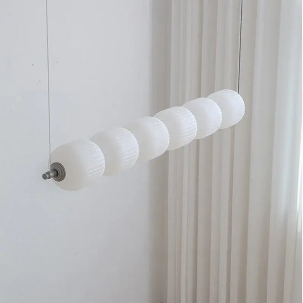 Modern Diffused Light Strip Pendant | Elegant Lighting Solution hanging elegantly with Art Deco-inspired design.