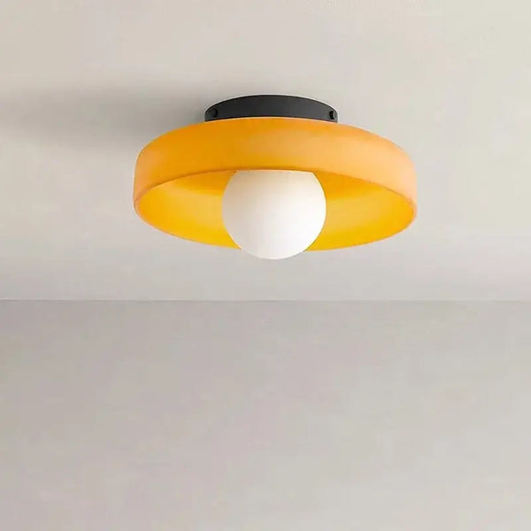 Retro Glass Disc Ceiling Light – Colourful Nordic Flush Mount Fixture for Hallways and Bedrooms in vibrant orange.