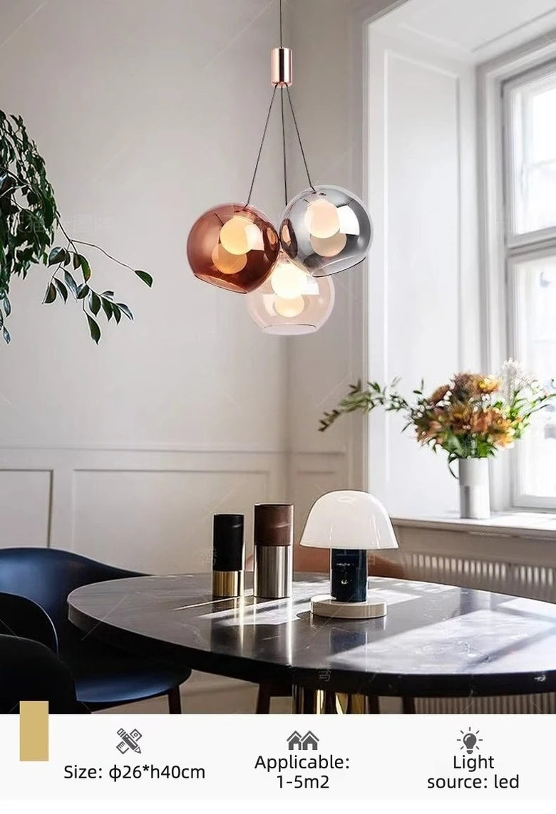 Triple Glass Globe Pendant Light with Rose Gold Accents