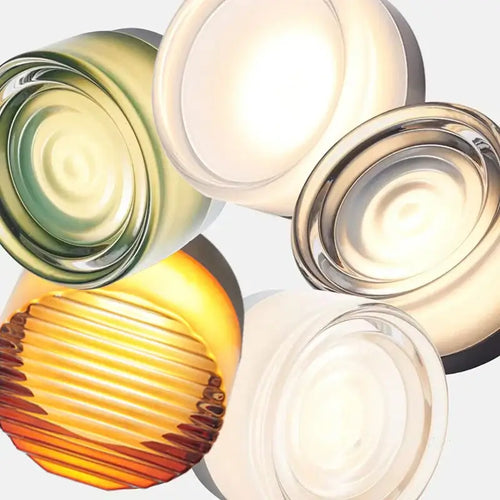 Futuristic and Unique Solid Plexiglass Wall Light designs featuring various colors and textures.