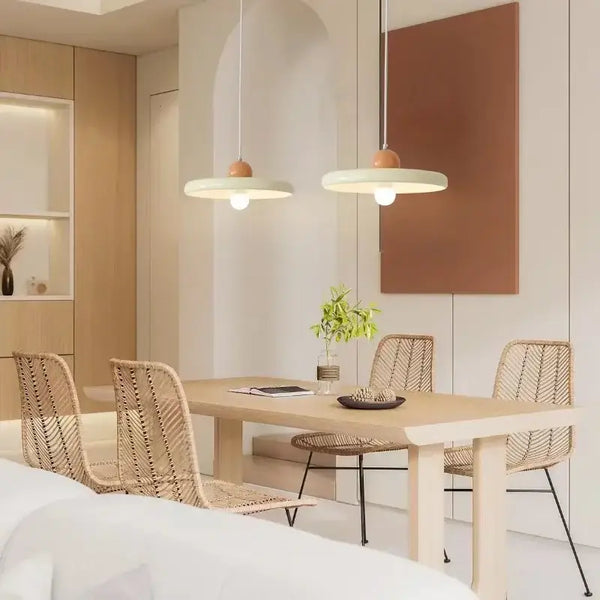 70s Dine In Kitchen Ceiling Light hanging above a wooden dining table in a modern kitchen space.