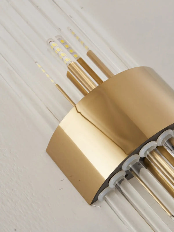 Black or Golden Art Deco Mural Lamp featuring elegant gold accents and clear rods for stylish wall lighting.
