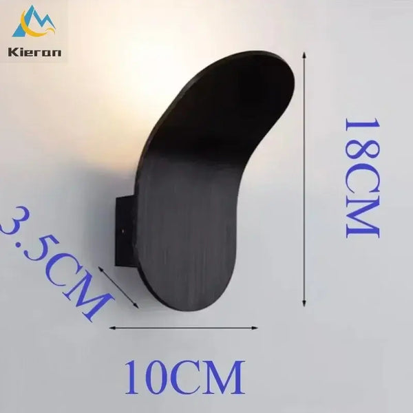 Wall Lamp: Mid-Century Modern Japanese Style, leaf-inspired design with dimensions 18x10x3.5 cm, mounted on a wall.
