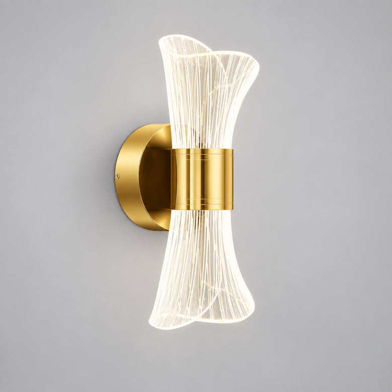 Hero Gold Bow LED Wall Light: with gold finish and white glass shade in a living room setting.