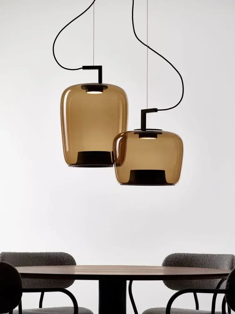 Modern Glass Pendant Light with Iron Detailing