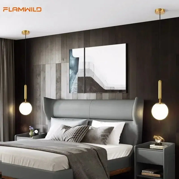 Mid-Century Modern Glass Ball Pendant Light in stylish bedroom setting with modern decor.