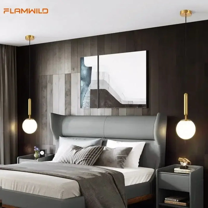 Mid-Century Modern Glass Ball Pendant Light in stylish bedroom setting with modern decor.