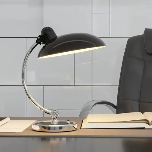 Bedside Table Lamp - Timeless Design and Modern Functionality in sleek black and chrome finish on a modern desk.