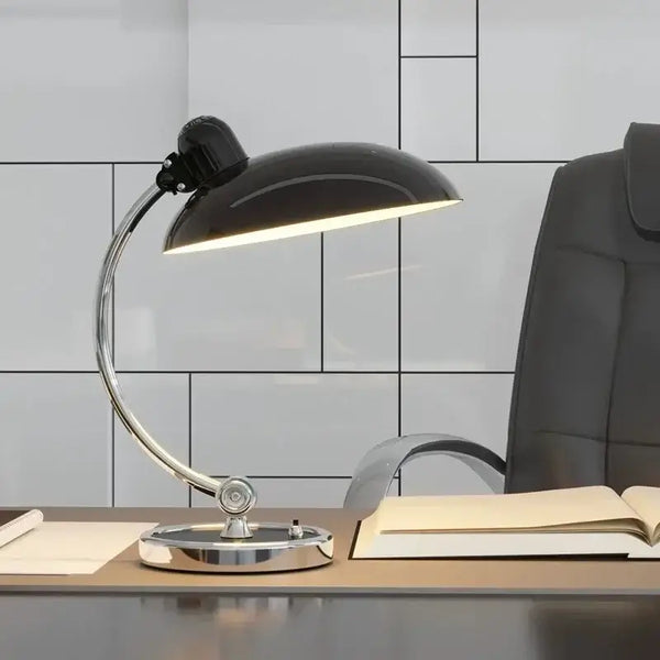 Bedside Table Lamp - Timeless Design and Modern Functionality in sleek black and chrome finish on a modern desk.