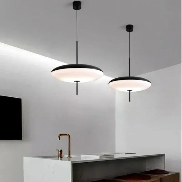 Nordic LED Pebble Pendant Light – Minimalist Ceiling Lamp hanging in a modern kitchen with a sleek design.