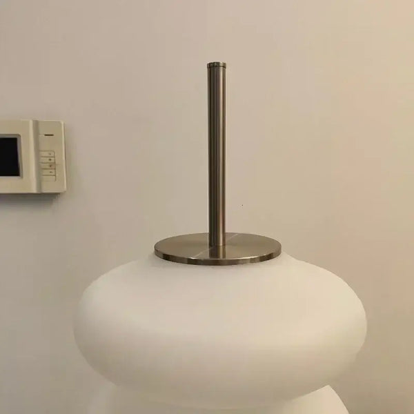 Danish Gourd Sculptural Floor Lamp – Nordic White Acrylic LED Lamp top view showing polished chrome stem and acrylic base.