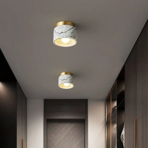 Italian Marble Downlight in Green or White Marble illuminating a modern interior.