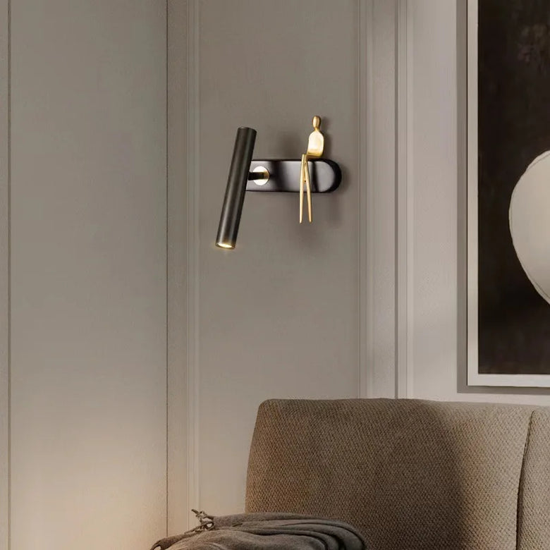 Minimalist Wall mounted Light with Seated human figure, Gold/Black