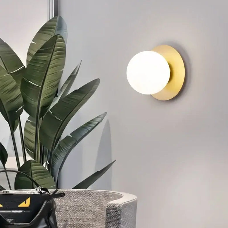 Simple Round Wall Lamp illuminating a modern interior with stylish design and energy-efficient lighting.