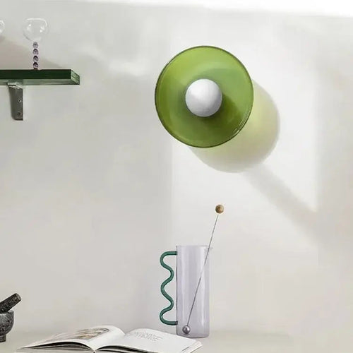 Nordic Modern Glass Disc Ceiling Light – Vibrant Single Head G9 Fixture for Hallways, Bedrooms & More on a minimalist wall.