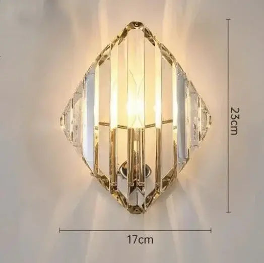 Unique Collection of Art Deco Sconces featuring elegant crystal design and warm lighting.