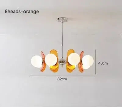 Rare Mid-Century Orange Plexiglass Chandelier: A Unique Vintage Gem with orange reflectors and white frosted glass balls.