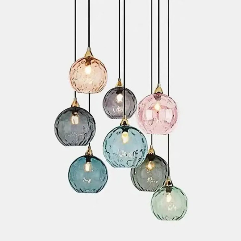 Delicious Lollipop Modern Pendant Light with colorful glass balls in vibrant hues hanging from sleek wires.