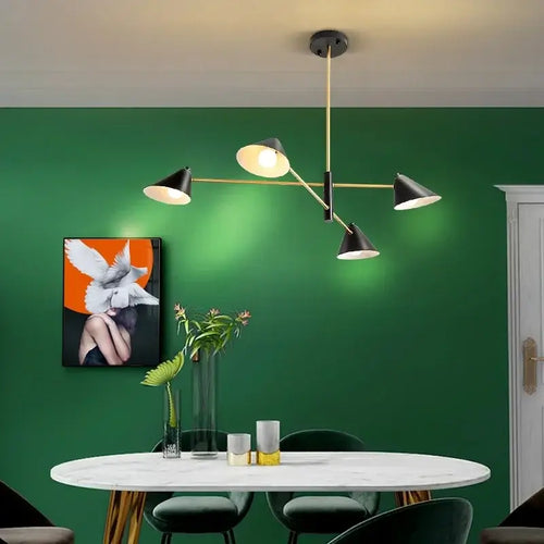Cone Shaped Classic 50s Pendant Light illuminating a green dining area with modern decor