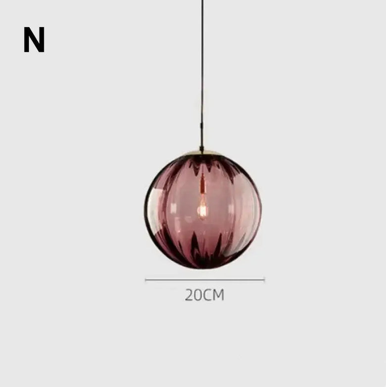 Delicious Lollipop Modern Pendant Light with vibrant pink glass ball design, perfect for modern decor.