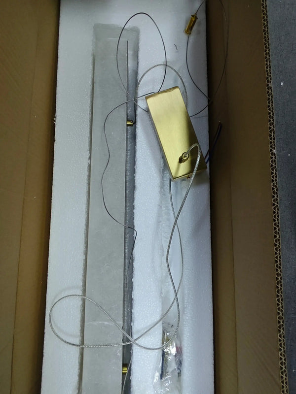Natural Marble Linear Pendant Light 80–120cm components including marble and polished copper details inside packaging.