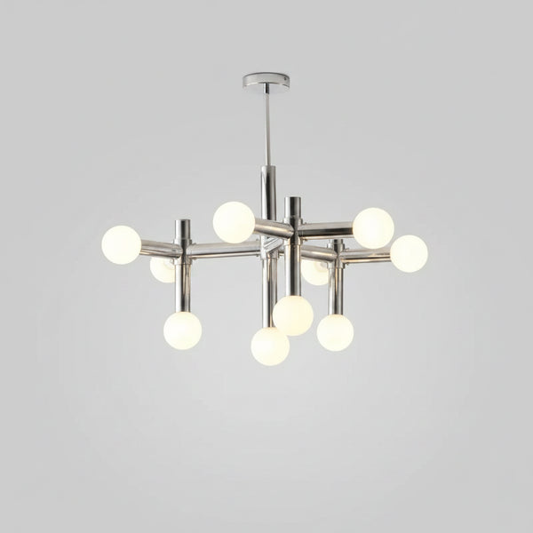 hero Bauhaus Chrome Chandelier with luminous glass globes, enhancing modern living room decor.