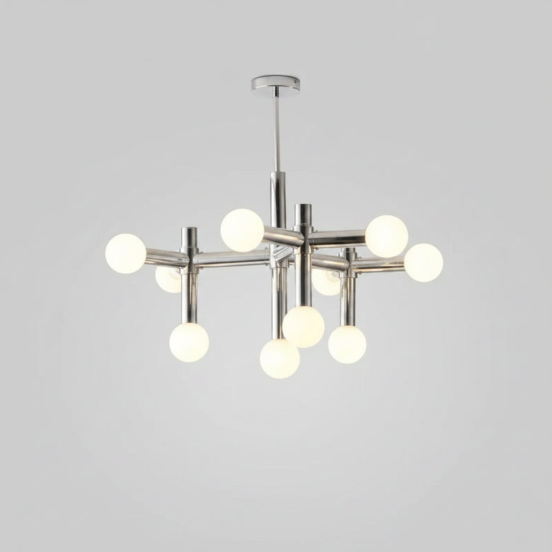hero Bauhaus Chrome Chandelier with luminous glass globes, enhancing modern living room decor.