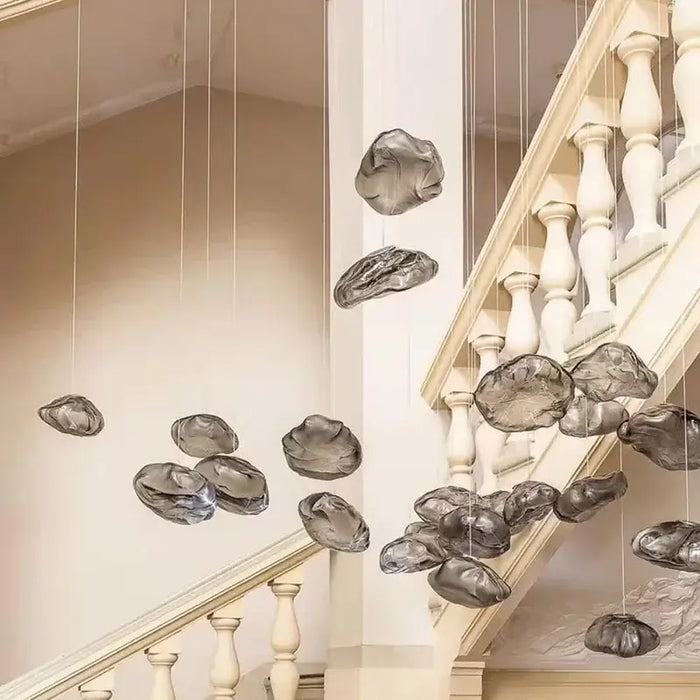 Nordic Cloud Glass Pendant Light – Smoky Grey Designer LED Chandelier hanging decoratively over a staircase.