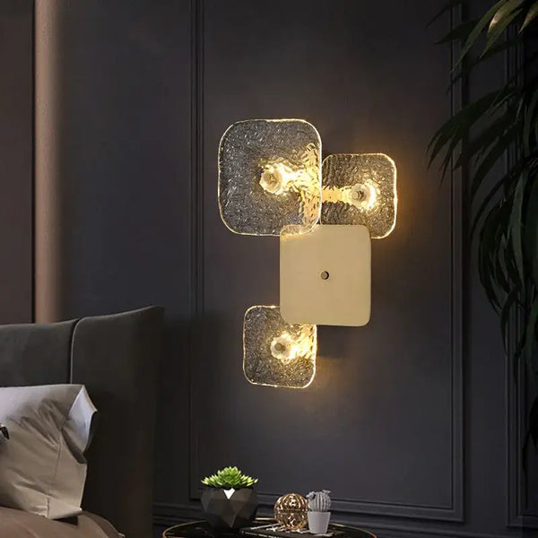 Astonishing Vintage Textured Glass and Brass Wall Lights illuminating a modern bedroom interior.