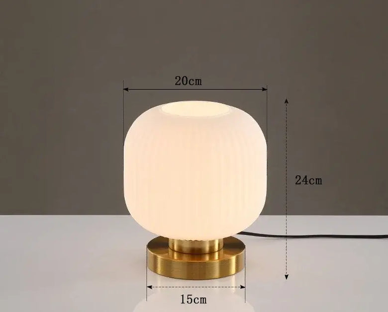 Modern Nordic Glass Table Lighting Fixtures with a sleek white glass shade and gold base, dimensions 20cm x 24cm.