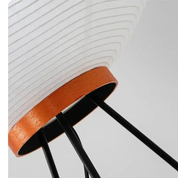 Close-up of Japanese Rice Paper Table Lamp showcasing its bamboo and black metal design.