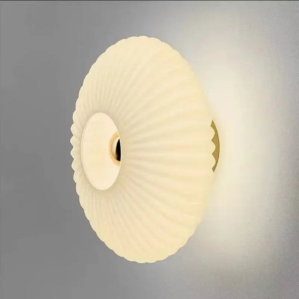 Radiant Modern Glass Wall Lamp featuring an elegant ridged design in frosted white for stylish illumination.