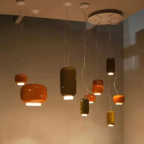 Modern Glass Pendant Light – Italian-Inspired LED Suspension Lamp in various colors hanging elegantly.