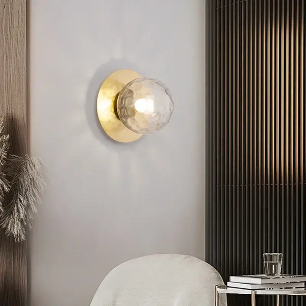 Simple Round Wall Lamp mounted on a modern wall, featuring a frosted glass shade and metallic base for stylish lighting.