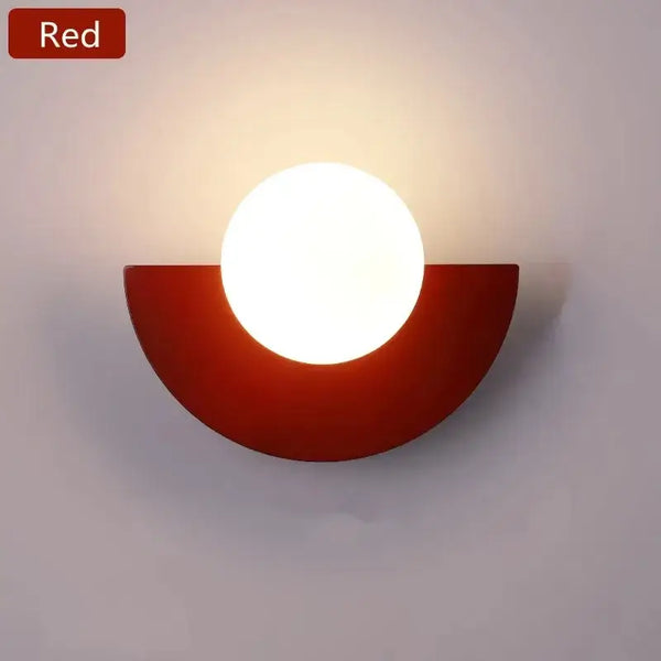Halfmoon Metal Sconce in red color with LED light and modern design, suitable for stylish interiors.