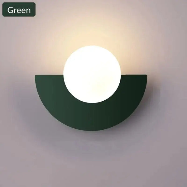 Halfmoon Metal Sconce in green color, featuring a circular LED light and Nordic design, ideal for stylish interiors.