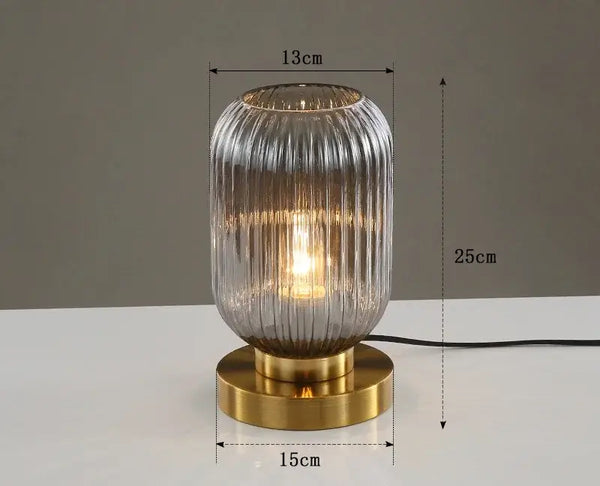 Modern Nordic Glass Table Lighting Fixtures featuring elegant glass design and gold base, adding sophistication to any decor.