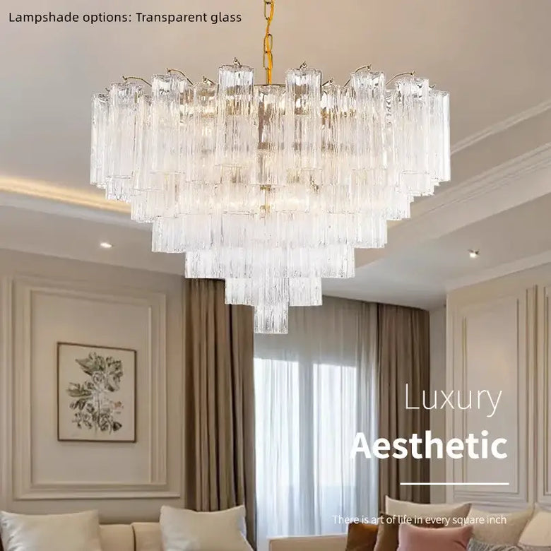 Murano Glass Tiered Chandelier with Gold Frame illuminated in elegant dining room setting.