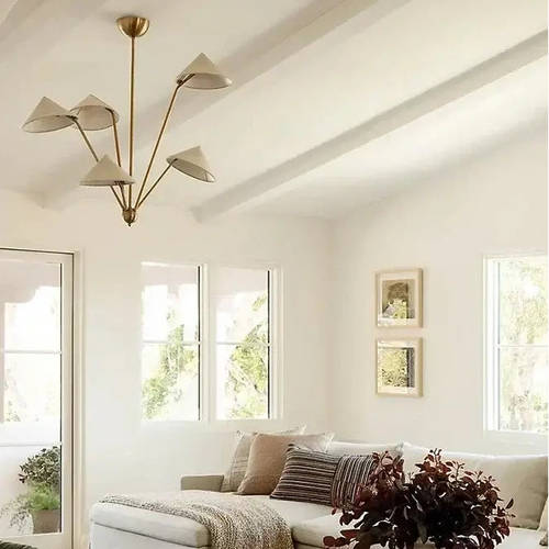 Chic Japansese Mid-Century Modern Ceiling Pendant elegantly illuminating a modern living room with white walls.